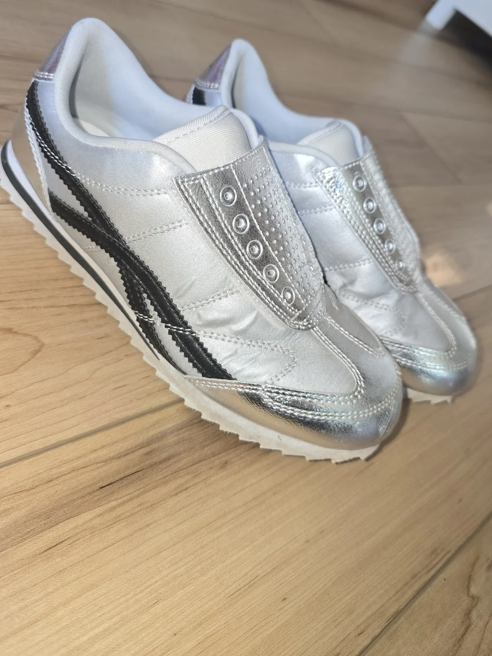 Silver Metallic Slip-On Girls Sneakers with Black Accent